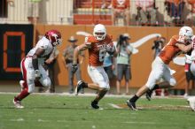 The University of Texas football team defeated the Arkansas Razorbacks with a score of 52-10 in Austin, TX on Saturday, September 27, 2008.

Filename: SRM_20080927_15090886.jpg
Aperture: f/5.6
Shutter Speed: 1/2000
Body: Canon EOS-1D Mark II
Lens: Canon EF 300mm f/2.8 L IS