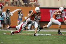 The University of Texas football team defeated the Arkansas Razorbacks with a score of 52-10 in Austin, TX on Saturday, September 27, 2008.

Filename: SRM_20080927_15090888.jpg
Aperture: f/5.6
Shutter Speed: 1/2000
Body: Canon EOS-1D Mark II
Lens: Canon EF 300mm f/2.8 L IS