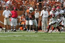 The University of Texas football team defeated the Arkansas Razorbacks with a score of 52-10 in Austin, TX on Saturday, September 27, 2008.

Filename: SRM_20080927_15121416.jpg
Aperture: f/5.6
Shutter Speed: 1/1250
Body: Canon EOS-1D Mark II
Lens: Canon EF 300mm f/2.8 L IS