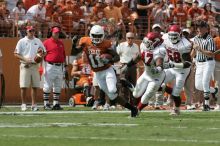 The University of Texas football team defeated the Arkansas Razorbacks with a score of 52-10 in Austin, TX on Saturday, September 27, 2008.

Filename: SRM_20080927_15121617.jpg
Aperture: f/5.6
Shutter Speed: 1/1600
Body: Canon EOS-1D Mark II
Lens: Canon EF 300mm f/2.8 L IS