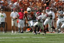 The University of Texas football team defeated the Arkansas Razorbacks with a score of 52-10 in Austin, TX on Saturday, September 27, 2008.

Filename: SRM_20080927_15121618.jpg
Aperture: f/5.6
Shutter Speed: 1/1600
Body: Canon EOS-1D Mark II
Lens: Canon EF 300mm f/2.8 L IS