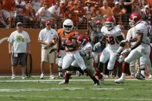 The University of Texas football team defeated the Arkansas Razorbacks with a score of 52-10 in Austin, TX on Saturday, September 27, 2008.

Filename: SRM_20080927_15121619.jpg
Aperture: f/5.6
Shutter Speed: 1/1600
Body: Canon EOS-1D Mark II
Lens: Canon EF 300mm f/2.8 L IS