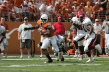 The University of Texas football team defeated the Arkansas Razorbacks with a score of 52-10 in Austin, TX on Saturday, September 27, 2008.

Filename: SRM_20080927_15121820.jpg
Aperture: f/5.6
Shutter Speed: 1/1600
Body: Canon EOS-1D Mark II
Lens: Canon EF 300mm f/2.8 L IS