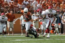 The University of Texas football team defeated the Arkansas Razorbacks with a score of 52-10 in Austin, TX on Saturday, September 27, 2008.

Filename: SRM_20080927_15121821.jpg
Aperture: f/5.6
Shutter Speed: 1/1600
Body: Canon EOS-1D Mark II
Lens: Canon EF 300mm f/2.8 L IS