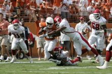 The University of Texas football team defeated the Arkansas Razorbacks with a score of 52-10 in Austin, TX on Saturday, September 27, 2008.

Filename: SRM_20080927_15121822.jpg
Aperture: f/5.6
Shutter Speed: 1/1250
Body: Canon EOS-1D Mark II
Lens: Canon EF 300mm f/2.8 L IS