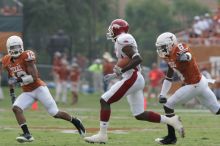 The University of Texas football team defeated the Arkansas Razorbacks with a score of 52-10 in Austin, TX on Saturday, September 27, 2008.

Filename: SRM_20080927_15243885.jpg
Aperture: f/6.3
Shutter Speed: 1/400
Body: Canon EOS-1D Mark II
Lens: Canon EF 300mm f/2.8 L IS