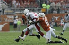 The University of Texas football team defeated the Arkansas Razorbacks with a score of 52-10 in Austin, TX on Saturday, September 27, 2008.

Filename: SRM_20080927_15244087.jpg
Aperture: f/6.3
Shutter Speed: 1/500
Body: Canon EOS-1D Mark II
Lens: Canon EF 300mm f/2.8 L IS