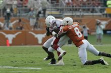 The University of Texas football team defeated the Arkansas Razorbacks with a score of 52-10 in Austin, TX on Saturday, September 27, 2008.

Filename: SRM_20080927_15244088.jpg
Aperture: f/6.3
Shutter Speed: 1/500
Body: Canon EOS-1D Mark II
Lens: Canon EF 300mm f/2.8 L IS