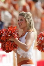 Texas Pom.  The University of Texas football team defeated the Arkansas Razorbacks with a score of 52-10 in Austin, TX on Saturday, September 27, 2008.

Filename: SRM_20080927_15313212.jpg
Aperture: f/5.6
Shutter Speed: 1/1600
Body: Canon EOS-1D Mark II
Lens: Canon EF 300mm f/2.8 L IS