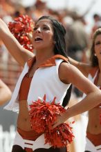 Texas Pom.  The University of Texas football team defeated the Arkansas Razorbacks with a score of 52-10 in Austin, TX on Saturday, September 27, 2008.

Filename: SRM_20080927_15415287.jpg
Aperture: f/5.6
Shutter Speed: 1/1250
Body: Canon EOS-1D Mark II
Lens: Canon EF 300mm f/2.8 L IS
