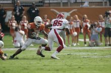 The University of Texas football team defeated the Arkansas Razorbacks with a score of 52-10 in Austin, TX on Saturday, September 27, 2008.

Filename: SRM_20080927_15465874.jpg
Aperture: f/5.6
Shutter Speed: 1/1250
Body: Canon EOS-1D Mark II
Lens: Canon EF 300mm f/2.8 L IS