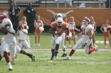 The University of Texas football team defeated the Arkansas Razorbacks with a score of 52-10 in Austin, TX on Saturday, September 27, 2008.

Filename: SRM_20080927_15505089.jpg
Aperture: f/5.6
Shutter Speed: 1/1000
Body: Canon EOS-1D Mark II
Lens: Canon EF 300mm f/2.8 L IS