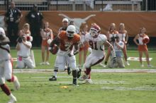 The University of Texas football team defeated the Arkansas Razorbacks with a score of 52-10 in Austin, TX on Saturday, September 27, 2008.

Filename: SRM_20080927_15505290.jpg
Aperture: f/5.6
Shutter Speed: 1/1250
Body: Canon EOS-1D Mark II
Lens: Canon EF 300mm f/2.8 L IS