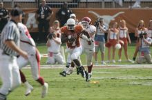 The University of Texas football team defeated the Arkansas Razorbacks with a score of 52-10 in Austin, TX on Saturday, September 27, 2008.

Filename: SRM_20080927_15505291.jpg
Aperture: f/5.6
Shutter Speed: 1/1250
Body: Canon EOS-1D Mark II
Lens: Canon EF 300mm f/2.8 L IS