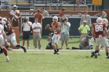 The University of Texas football team defeated the Arkansas Razorbacks with a score of 52-10 in Austin, TX on Saturday, September 27, 2008.

Filename: SRM_20080927_15531406.jpg
Aperture: f/5.6
Shutter Speed: 1/1000
Body: Canon EOS-1D Mark II
Lens: Canon EF 300mm f/2.8 L IS