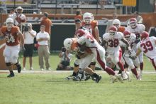 The University of Texas football team defeated the Arkansas Razorbacks with a score of 52-10 in Austin, TX on Saturday, September 27, 2008.

Filename: SRM_20080927_15531610.jpg
Aperture: f/5.6
Shutter Speed: 1/1000
Body: Canon EOS-1D Mark II
Lens: Canon EF 300mm f/2.8 L IS