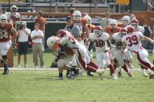 The University of Texas football team defeated the Arkansas Razorbacks with a score of 52-10 in Austin, TX on Saturday, September 27, 2008.

Filename: SRM_20080927_15531611.jpg
Aperture: f/5.6
Shutter Speed: 1/1000
Body: Canon EOS-1D Mark II
Lens: Canon EF 300mm f/2.8 L IS