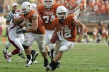 The University of Texas football team defeated the Arkansas Razorbacks with a score of 52-10 in Austin, TX on Saturday, September 27, 2008.

Filename: SRM_20080927_15584086.jpg
Aperture: f/5.6
Shutter Speed: 1/640
Body: Canon EOS-1D Mark II
Lens: Canon EF 300mm f/2.8 L IS