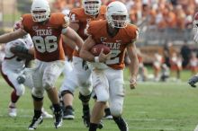 The University of Texas football team defeated the Arkansas Razorbacks with a score of 52-10 in Austin, TX on Saturday, September 27, 2008.

Filename: SRM_20080927_15584288.jpg
Aperture: f/5.6
Shutter Speed: 1/640
Body: Canon EOS-1D Mark II
Lens: Canon EF 300mm f/2.8 L IS