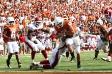 The University of Texas football team defeated the Arkansas Razorbacks with a score of 52-10 in Austin, TX on Saturday, September 27, 2008.

Filename: SRM_20080927_15592474.jpg
Aperture: f/5.6
Shutter Speed: 1/1000
Body: Canon EOS 20D
Lens: Canon EF 80-200mm f/2.8 L