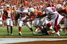 The University of Texas football team defeated the Arkansas Razorbacks with a score of 52-10 in Austin, TX on Saturday, September 27, 2008.

Filename: SRM_20080927_15592475.jpg
Aperture: f/5.6
Shutter Speed: 1/1600
Body: Canon EOS 20D
Lens: Canon EF 80-200mm f/2.8 L