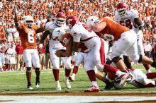 The University of Texas football team defeated the Arkansas Razorbacks with a score of 52-10 in Austin, TX on Saturday, September 27, 2008.

Filename: SRM_20080927_15592676.jpg
Aperture: f/5.6
Shutter Speed: 1/1000
Body: Canon EOS 20D
Lens: Canon EF 80-200mm f/2.8 L