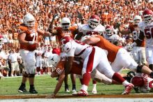 The University of Texas football team defeated the Arkansas Razorbacks with a score of 52-10 in Austin, TX on Saturday, September 27, 2008.

Filename: SRM_20080927_15592677.jpg
Aperture: f/5.6
Shutter Speed: 1/1250
Body: Canon EOS 20D
Lens: Canon EF 80-200mm f/2.8 L