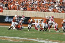 The University of Texas football team defeated the Arkansas Razorbacks with a score of 52-10 in Austin, TX on Saturday, September 27, 2008.

Filename: SRM_20080927_16262625.jpg
Aperture: f/5.0
Shutter Speed: 1/2500
Body: Canon EOS-1D Mark II
Lens: Canon EF 300mm f/2.8 L IS