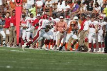 The University of Texas football team defeated the Arkansas Razorbacks with a score of 52-10 in Austin, TX on Saturday, September 27, 2008.

Filename: SRM_20080927_16272432.jpg
Aperture: f/5.0
Shutter Speed: 1/3200
Body: Canon EOS-1D Mark II
Lens: Canon EF 300mm f/2.8 L IS