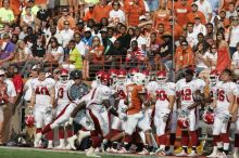 The University of Texas football team defeated the Arkansas Razorbacks with a score of 52-10 in Austin, TX on Saturday, September 27, 2008.

Filename: SRM_20080927_16272635.jpg
Aperture: f/5.0
Shutter Speed: 1/3200
Body: Canon EOS-1D Mark II
Lens: Canon EF 300mm f/2.8 L IS