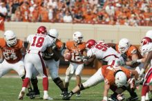 The University of Texas football team defeated the Arkansas Razorbacks with a score of 52-10 in Austin, TX on Saturday, September 27, 2008.

Filename: SRM_20080927_16282642.jpg
Aperture: f/5.0
Shutter Speed: 1/2500
Body: Canon EOS-1D Mark II
Lens: Canon EF 300mm f/2.8 L IS