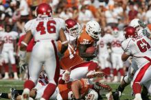 The University of Texas football team defeated the Arkansas Razorbacks with a score of 52-10 in Austin, TX on Saturday, September 27, 2008.

Filename: SRM_20080927_16290051.jpg
Aperture: f/5.0
Shutter Speed: 1/3200
Body: Canon EOS-1D Mark II
Lens: Canon EF 300mm f/2.8 L IS