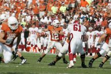 The University of Texas football team defeated the Arkansas Razorbacks with a score of 52-10 in Austin, TX on Saturday, September 27, 2008.

Filename: SRM_20080927_16293865.jpg
Aperture: f/5.0
Shutter Speed: 1/3200
Body: Canon EOS-1D Mark II
Lens: Canon EF 300mm f/2.8 L IS