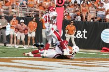 The University of Texas football team defeated the Arkansas Razorbacks with a score of 52-10 in Austin, TX on Saturday, September 27, 2008.

Filename: SRM_20080927_16294068.jpg
Aperture: f/5.0
Shutter Speed: 1/2500
Body: Canon EOS-1D Mark II
Lens: Canon EF 300mm f/2.8 L IS