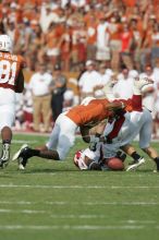 The University of Texas football team defeated the Arkansas Razorbacks with a score of 52-10 in Austin, TX on Saturday, September 27, 2008.

Filename: SRM_20080927_16341608.jpg
Aperture: f/5.0
Shutter Speed: 1/2000
Body: Canon EOS-1D Mark II
Lens: Canon EF 300mm f/2.8 L IS