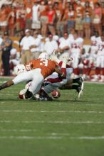 The University of Texas football team defeated the Arkansas Razorbacks with a score of 52-10 in Austin, TX on Saturday, September 27, 2008.

Filename: SRM_20080927_16341609.jpg
Aperture: f/5.0
Shutter Speed: 1/2000
Body: Canon EOS-1D Mark II
Lens: Canon EF 300mm f/2.8 L IS