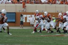 The University of Texas football team defeated the Arkansas Razorbacks with a score of 52-10 in Austin, TX on Saturday, September 27, 2008.

Filename: SRM_20080927_16422660.jpg
Aperture: f/5.6
Shutter Speed: 1/1250
Body: Canon EOS-1D Mark II
Lens: Canon EF 300mm f/2.8 L IS