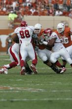 The University of Texas football team defeated the Arkansas Razorbacks with a score of 52-10 in Austin, TX on Saturday, September 27, 2008.

Filename: SRM_20080927_16434083.jpg
Aperture: f/5.6
Shutter Speed: 1/1000
Body: Canon EOS-1D Mark II
Lens: Canon EF 300mm f/2.8 L IS