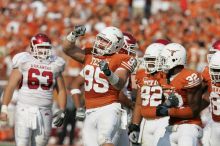 The University of Texas football team defeated the Arkansas Razorbacks with a score of 52-10 in Austin, TX on Saturday, September 27, 2008.

Filename: SRM_20080927_16520435.jpg
Aperture: f/5.6
Shutter Speed: 1/3200
Body: Canon EOS-1D Mark II
Lens: Canon EF 300mm f/2.8 L IS