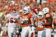 The University of Texas football team defeated the Arkansas Razorbacks with a score of 52-10 in Austin, TX on Saturday, September 27, 2008.

Filename: SRM_20080927_16520436.jpg
Aperture: f/5.6
Shutter Speed: 1/3200
Body: Canon EOS-1D Mark II
Lens: Canon EF 300mm f/2.8 L IS