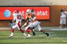 The University of Texas football team defeated the Arkansas Razorbacks with a score of 52-10 in Austin, TX on Saturday, September 27, 2008.

Filename: SRM_20080927_16555870.jpg
Aperture: f/5.6
Shutter Speed: 1/1250
Body: Canon EOS-1D Mark II
Lens: Canon EF 300mm f/2.8 L IS