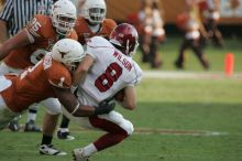 The University of Texas football team defeated the Arkansas Razorbacks with a score of 52-10 in Austin, TX on Saturday, September 27, 2008.

Filename: SRM_20080927_17034293.jpg
Aperture: f/5.6
Shutter Speed: 1/1000
Body: Canon EOS-1D Mark II
Lens: Canon EF 300mm f/2.8 L IS