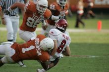 The University of Texas football team defeated the Arkansas Razorbacks with a score of 52-10 in Austin, TX on Saturday, September 27, 2008.

Filename: SRM_20080927_17034294.jpg
Aperture: f/5.6
Shutter Speed: 1/1000
Body: Canon EOS-1D Mark II
Lens: Canon EF 300mm f/2.8 L IS