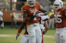 The University of Texas football team defeated the Arkansas Razorbacks with a score of 52-10 in Austin, TX on Saturday, September 27, 2008.

Filename: SRM_20080927_17034604.jpg
Aperture: f/5.6
Shutter Speed: 1/1000
Body: Canon EOS-1D Mark II
Lens: Canon EF 300mm f/2.8 L IS