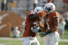 The University of Texas football team defeated the Arkansas Razorbacks with a score of 52-10 in Austin, TX on Saturday, September 27, 2008.

Filename: SRM_20080927_17034810.jpg
Aperture: f/5.6
Shutter Speed: 1/1000
Body: Canon EOS-1D Mark II
Lens: Canon EF 300mm f/2.8 L IS