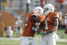 The University of Texas football team defeated the Arkansas Razorbacks with a score of 52-10 in Austin, TX on Saturday, September 27, 2008.

Filename: SRM_20080927_17035011.jpg
Aperture: f/5.6
Shutter Speed: 1/800
Body: Canon EOS-1D Mark II
Lens: Canon EF 300mm f/2.8 L IS