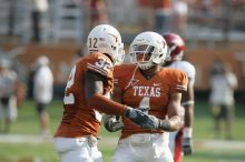 The University of Texas football team defeated the Arkansas Razorbacks with a score of 52-10 in Austin, TX on Saturday, September 27, 2008.

Filename: SRM_20080927_17035012.jpg
Aperture: f/5.6
Shutter Speed: 1/1000
Body: Canon EOS-1D Mark II
Lens: Canon EF 300mm f/2.8 L IS