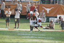 The University of Texas football team defeated the Arkansas Razorbacks with a score of 52-10 in Austin, TX on Saturday, September 27, 2008.

Filename: SRM_20080927_17072841.jpg
Aperture: f/5.6
Shutter Speed: 1/800
Body: Canon EOS-1D Mark II
Lens: Canon EF 300mm f/2.8 L IS