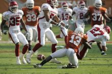 The University of Texas football team defeated the Arkansas Razorbacks with a score of 52-10 in Austin, TX on Saturday, September 27, 2008.

Filename: SRM_20080927_17081053.jpg
Aperture: f/5.6
Shutter Speed: 1/1600
Body: Canon EOS-1D Mark II
Lens: Canon EF 300mm f/2.8 L IS