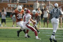 The University of Texas football team defeated the Arkansas Razorbacks with a score of 52-10 in Austin, TX on Saturday, September 27, 2008.

Filename: SRM_20080927_17121084.jpg
Aperture: f/5.6
Shutter Speed: 1/1000
Body: Canon EOS-1D Mark II
Lens: Canon EF 300mm f/2.8 L IS